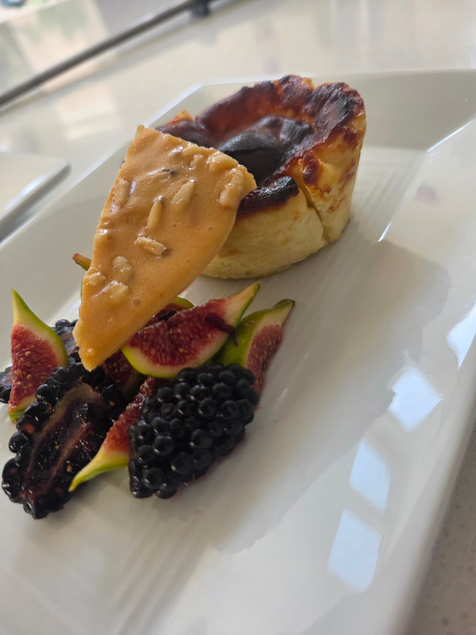 Individual Basque Cheesecake with Seasonal Berries and Piñon Brittle