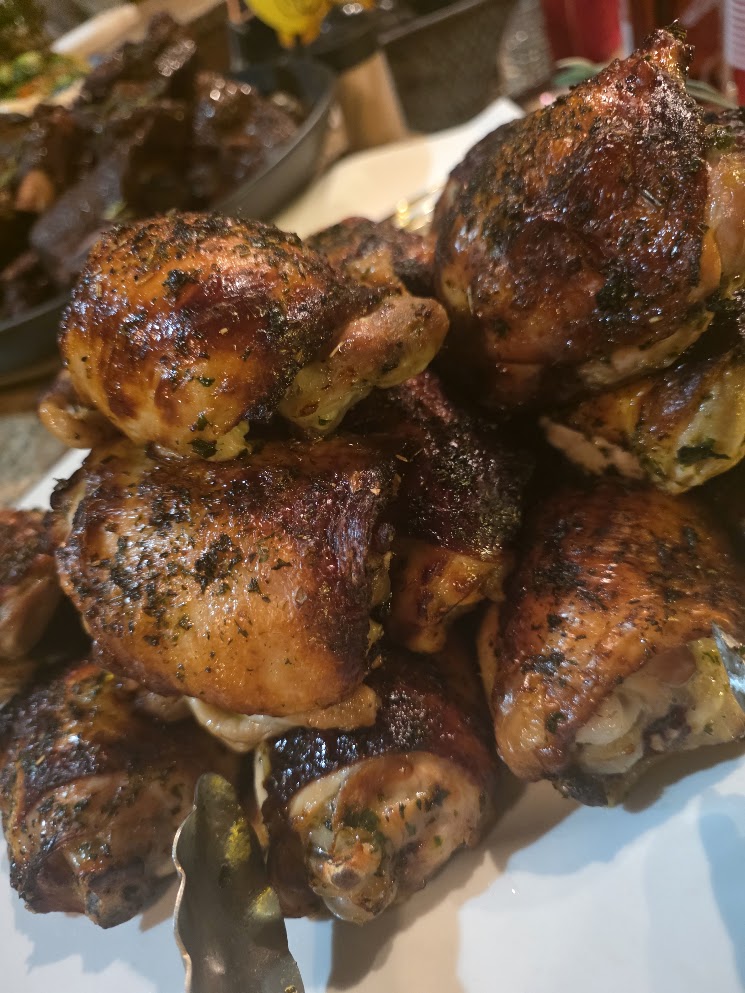 Roasted chicken thighs prepared for group service